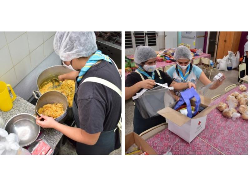 Scout reparten alimentos